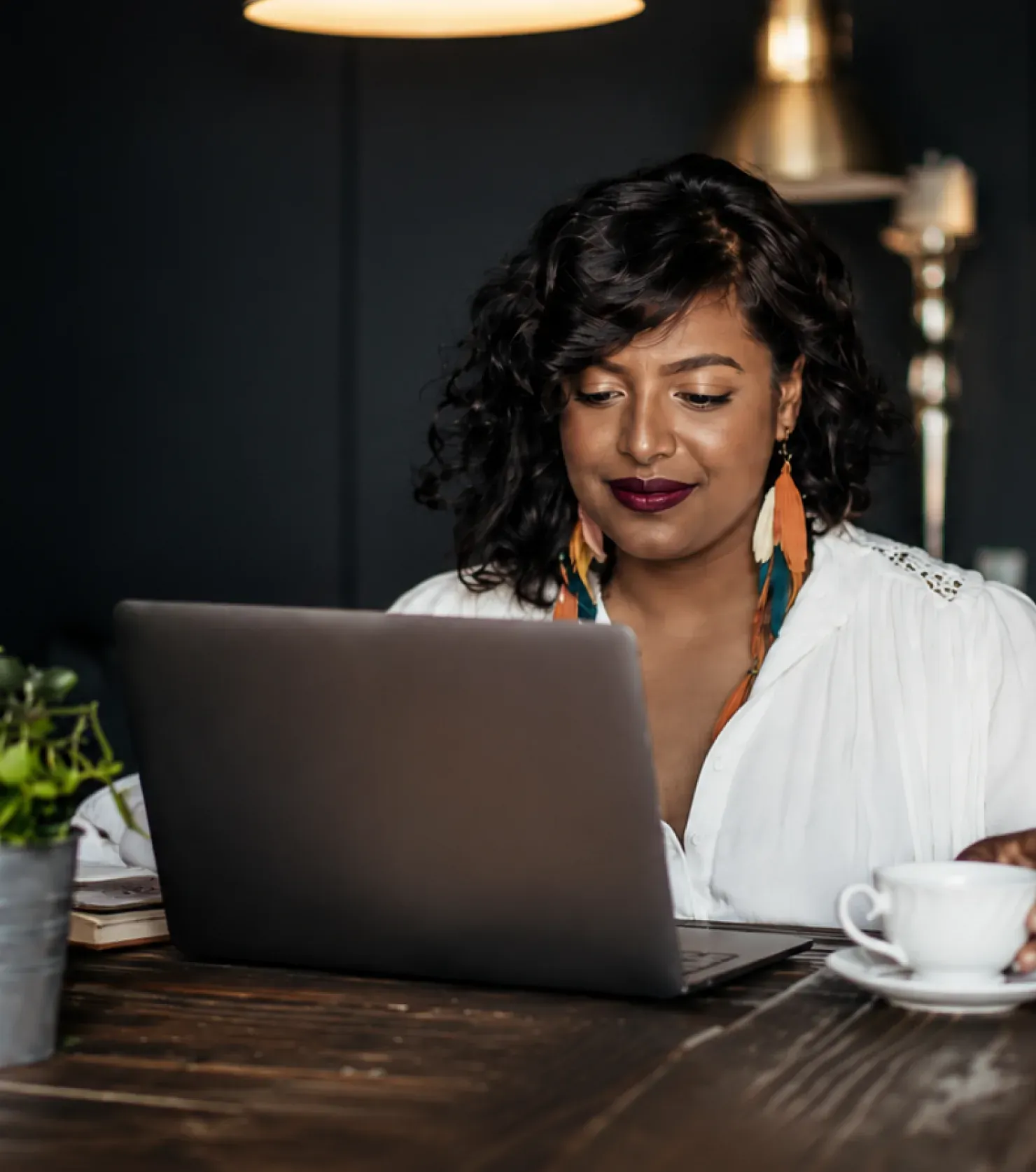 A founder working at a laptop